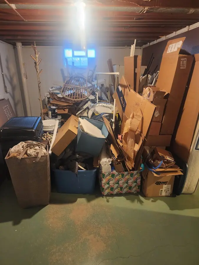 Roll-off dumpster container at job site for Cleanout Dumpster Rental in Leeds